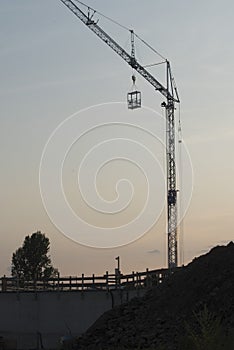 Construction crane in building industry