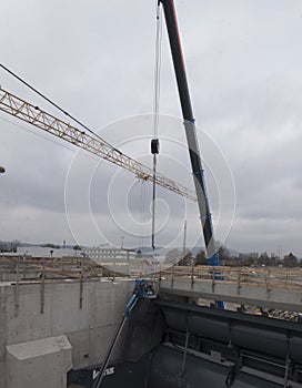 Construction crane in building industry