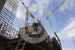 Construction crane in building industry