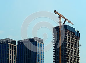 Construction crane doing new architecture background