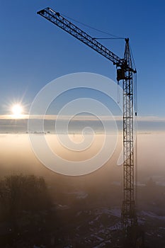 Construction Crane foggy morning Vancouver