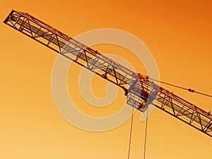 Construction crane jib, sunset