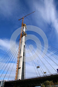 Construction crane lifting workers