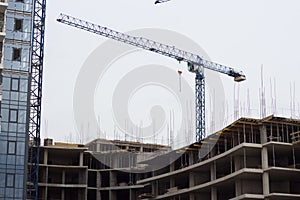 Construction crane near the house