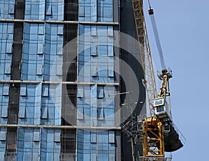 Construction crane next to a building