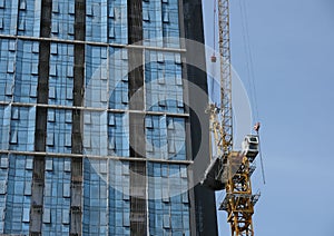 Construction crane next to a building