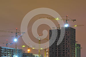 Construction crane at night.