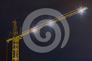 Construction crane at night