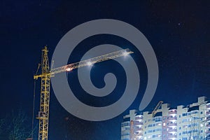 Construction crane at night