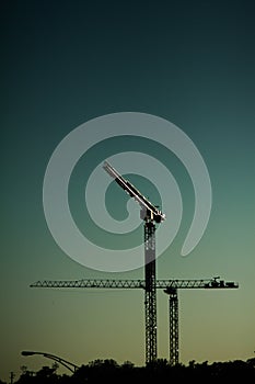 Construction crane silhouette (sunset)