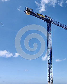 Crane isolated in the blue sky background. photo