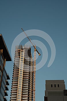Construction Crane working on a skyscraper