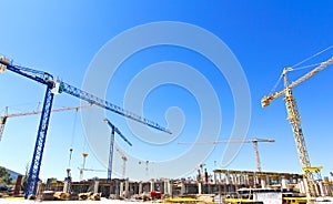 Construction cranes on a building site