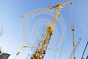 Construction -cranes inside building-site