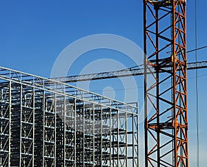 Construction cranes with a metal structure frame