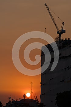 Construction cranes of tall buildings