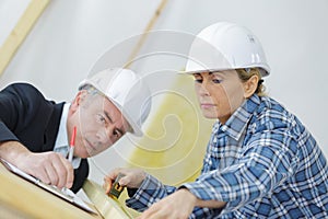 Construction designer writing instructions
