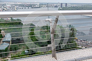 Construction details of a glass bridge with steel fixtures.