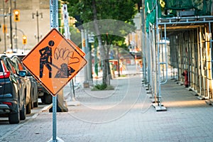 Construction dig sign on Winnipeg sidewalk