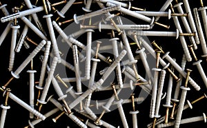 Construction dowel nails are scattered