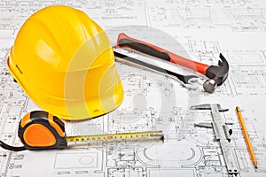 Construction drafts and tools background photo