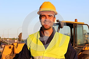 Construction driver with excavator on the background