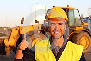 Construction driver with excavator on the background