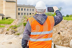 Construction Engineer filmed on cell phone