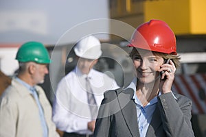 Construction engineer on her cellphone