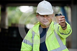 Builder worker eats at construction site