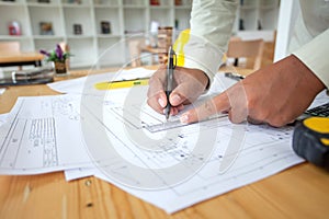 Construction engineering. Architect drawing blueprints and engineering tools on workplace