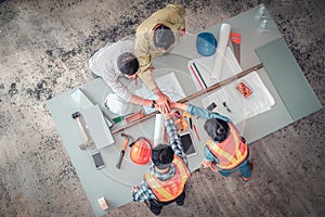 Construction Engineering Team Handshake Together After Dealing Their Project Successful. Engineers Management Teamwork are