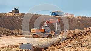 Construction equipment for the building of a drainage system excavator digs.