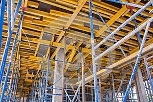 Construction site work. Concrete formwork and floor bams. Construction beam falsework for concrete