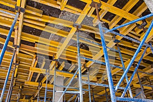 Construction site work. Concrete formwork and floor bams. Construction beam falsework for concrete photo