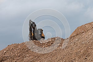 Construction equipment working on road widening