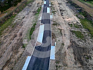 construction in fields on native soil. where the developer will bring networks