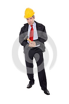 Construction Foreman holding a hammer