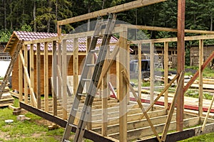 construction of a frame house. Timber frame house, new build roof