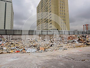 Construction garbage on the city street after the demolition of the building.