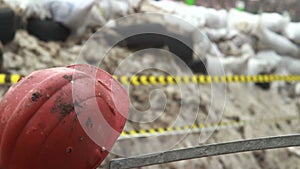 Construction hard hat barricades of snow tyres barbed wires