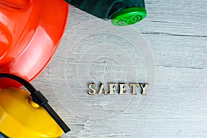 Construction helmet is a symbol of safety in the workplace. Set of tools. Safety concept Selective focus. DIY
