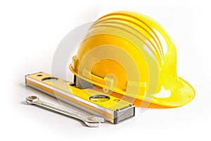 Construction helmet and tools for engineering work project on white background