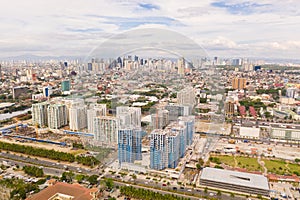 Construction of high modern houses in Manila. The city of Manila, the capital of the Philippines. Modern metropolis in