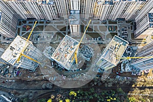 Construction of high-rise apartment buildings. top view aerial photo from flying drone