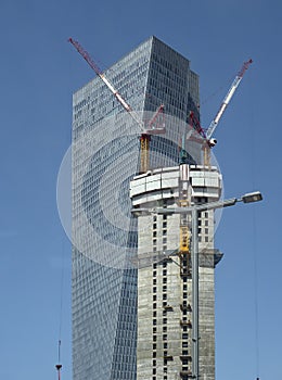 The construction of a high-rise building against the background of an already built high-rise building. Israel, Tel Aviv