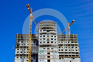 Construction of a high-rise building. Huge Crane