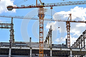 Construction of high-rise buildings, the supply of building materials with the help of a crane