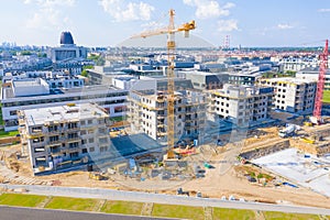 Construction of high-rise residential building. Aerial view of construction of high-rise apartment building. Warsaw Wilanow