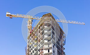 Construction of a high-rise residential building. Construction Crane